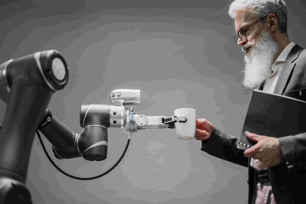 AI automation services for small businesses in 2026, featuring an AI robot, a business owner using a laptop, and benefits such as saving time, reducing costs, and increasing productivity.